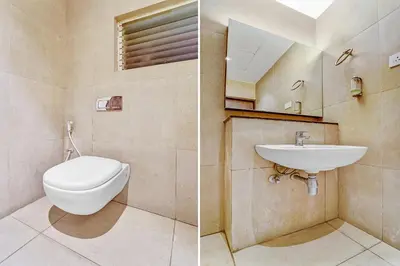 two pictures of a bathroom with a toilet and a sink at Hotel Karpagam Lodging House Nr Railway Station & Gandhipuram bus stand in Coimbatore