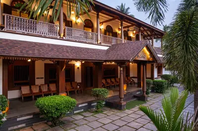 an image of a resort with tables and chairs at Villa de 1945 in Mahe
