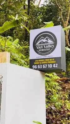 a sign for the new york villas forestry at Niel Valley Homestay - Poomala in Mulagunnathukāvu