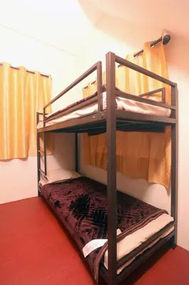 a couple of bunk beds in a room at HIGHLAND Hills in Coonoor