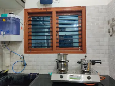 a kitchen with a mixer on a counter with a window at Kamadhenu Homestay, Comapact 2BHK OPP Mysore zoo, A in Mysore