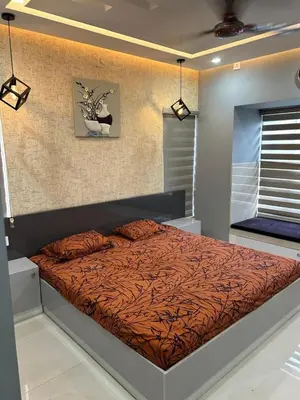 a bedroom with a bed in a room at Modern 5BR Villa in Thrissur in Trichūr