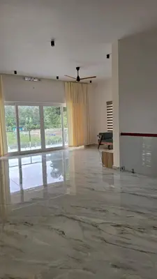 a living room with a marble floor and a piano at Casa Bella - The Group Stay in Sultan Bathery