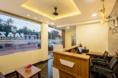 an office with a reception desk and a window at Hotel faaz international in Thottada