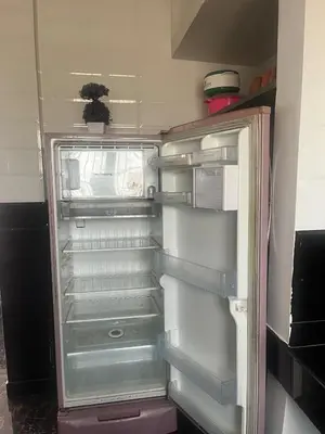 an empty refrigerator with its door open in a kitchen at AC 3BHK Full House Kitchen strong WiFi Pollachi in Pollāchi