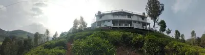 a building sitting on top of a hill at Ken valley homes & villa in Lovedale