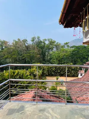 a view from the balcony of a house at Tapovan Green County Resorts in Thattakād
