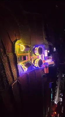 an overhead view of a building with purple lights at Airas Resort in Kūkkāl