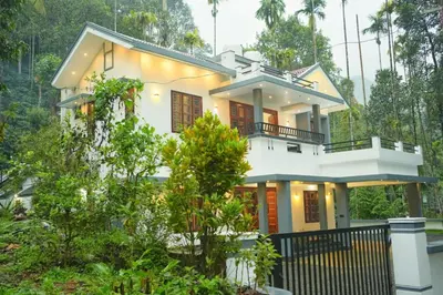 a house in the middle of a forest at Whispering Streams in Tariyod