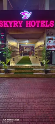 a building with a sign that reads skyley hotels at Skyry Hotels Gandhipuram in Coimbatore