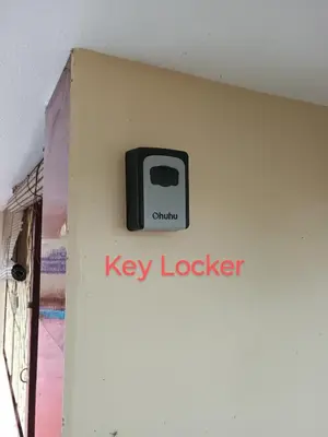 a key locker on the wall of a room at Home away from home in Palakkad in Palakkad