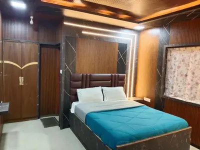 a bedroom with a bed in a room at Sri Krishna residency in Ooty