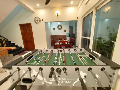 a large pool table in the middle of a living room at Casa de Shalom - 3 Bedroom AC Villa 65