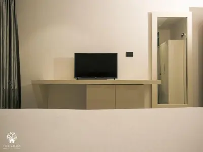 a television sitting on a table in a room at Tree Valley Resort Wayanad in Meppādi