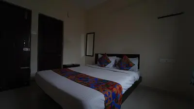 a bedroom with a large bed in a room at Aangal residency in Coimbatore