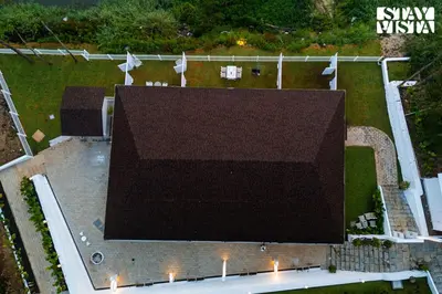 an overhead view of a large building with lights at StayVista at Mudra Tattva - Pvt Pool,Lawn,Jacuzzi 2BR Luxury Rooms in Suntikoppa