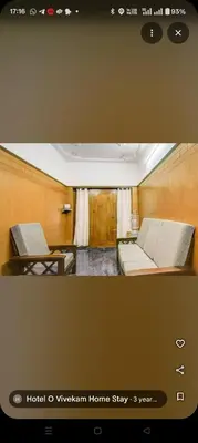 a picture of a room with a bed and a couch at The vivekam Homestay nr Hindustan college Nava india in Singānallūr