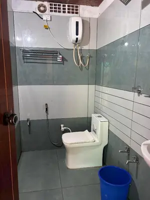 a small bathroom with a toilet and a sink at Kanthalloor puregolds in Kanthalloor