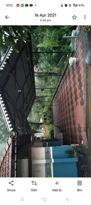 a screenshot of a picture of a building at Morning mist holidays Thusharagiri in Vallikavungal