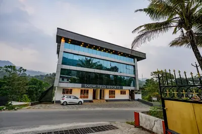 a car parked in front of a building at Skybz Resort - Mankulam in Viripara