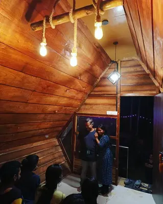a man and a woman standing in the corner of a room at DEEP ViLLA in Batheri