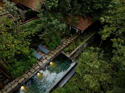 an overhead view of a pond in a garden at Avana Holiday Experiences,Wayanad in Kalpetta