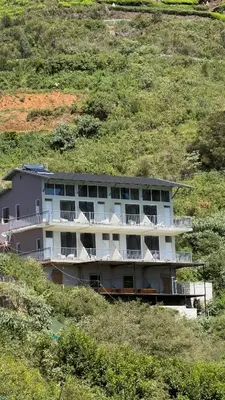 a large building on top of a hill at Teyt Grand View in Ketti