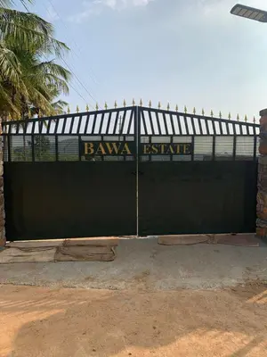 a black gate with a sign that reads banyon estate at Tusker & Gaur - Bandipur
