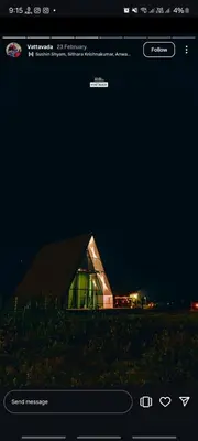 a screenshot of a webpage of a building at night at Misty Colina in Kottakamboor