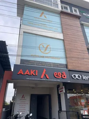 a akiba store with a sign in front of it at AAKI Comforts in Mysore
