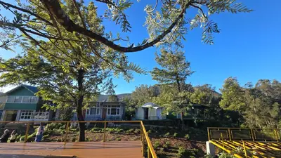 a view of the house from the deck at Silver lake nature escape in Ooty