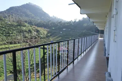 a balcony with a view of a valley at Kerith in Kodaikānāl