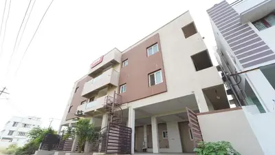 a building with stairs in front of it at H N Residency in Coimbatore