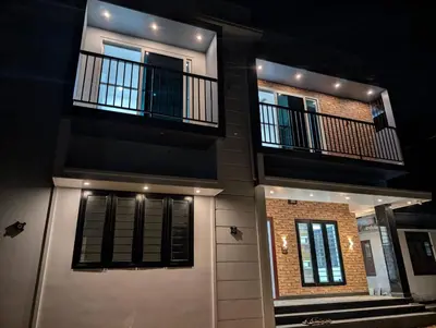a building with two balconies on top of it at Nana's Residency in Ernakulam