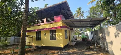 a house under construction with a roof at JJ's Farmhouse in Thanniyam