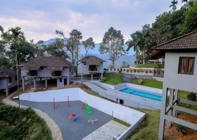 an aerial view of a house with a playground at Rippon Mount Resorts in Meppādi