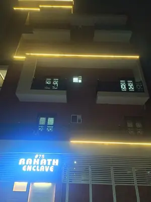 a building with a sign that reads north engine at Royal Stay Mysuru Service Apartment in Mysore