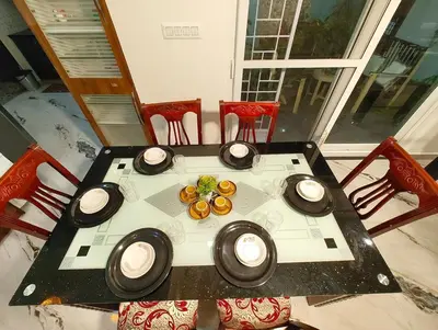 a table with some food on top of it at shalom 3bhk in Mysore