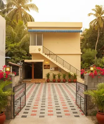a house with a gate in front of it at Sai Sadan Residency in Lakkidi