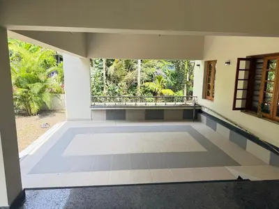 an empty room with a window in a house at Premium house near Cochin Airport for NRI families in Nedumbassery