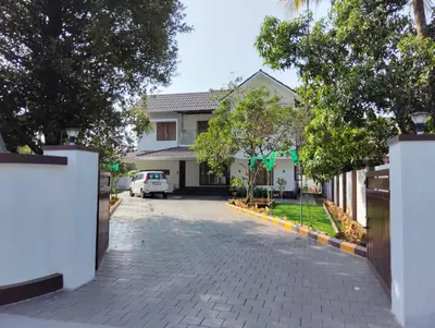 a driveway in front of a house at Mellow Villa cochin airport in Angamali