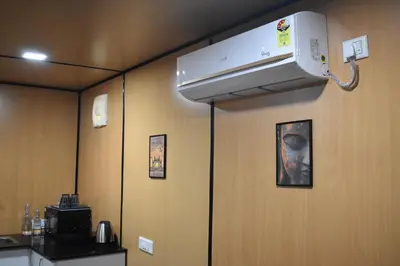 a room with a air conditioner on the wall at GUDU by Coexist in Mysore