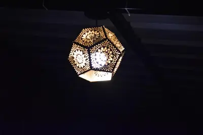 a chandelier hanging from a ceiling in a room at GUDU by Coexist in Mysore
