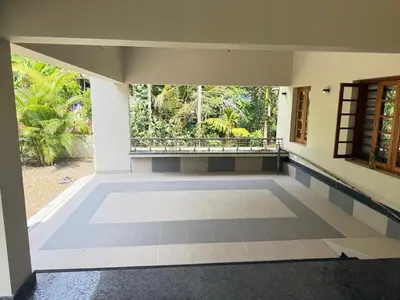 an empty room with a window in a house at Premium house near Cochin Airport for NRI families in Nedumbassery