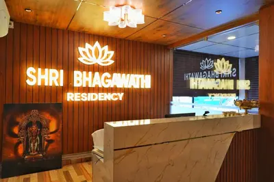 a sign that reads sharma blossom restaurantreception at Shri Bhagawathi Residency in Palani