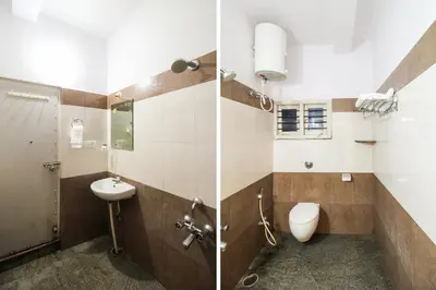two pictures of a bathroom with a toilet and a sink at Hotel O Kingston Residency in Vānivilāsa Puram