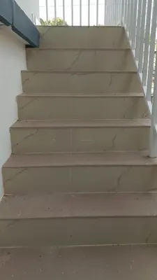 a set of stairs in a house with at Krishna stays in Manattala
