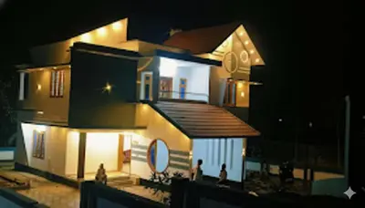 a lit up house at night with people standing outside at Anjali Holiday Home in Tindummal