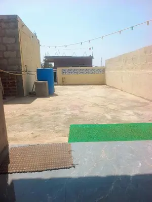 a roof of a building with a green line on it at Affordable home stay in Chāmrājnagar