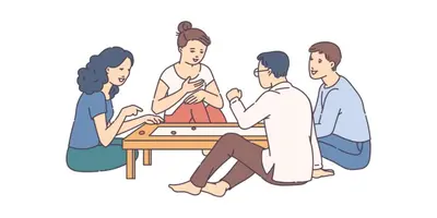 a group of people sitting around a table playing billiard at cozstel in Kozhikode